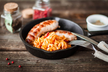 Grilled sausage with cabbage