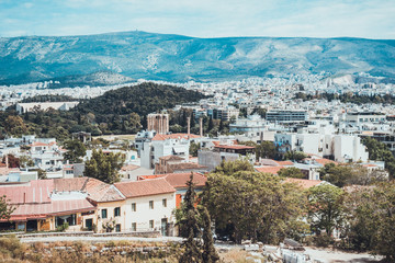Obraz premium Various apartments and houses leading down to city
