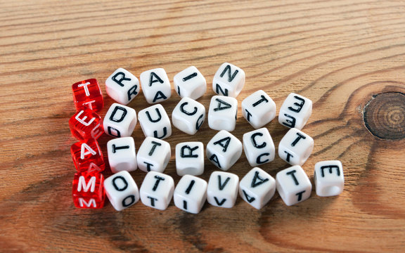 Team acronym on dices
