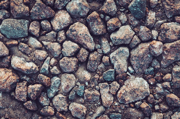 Background wall made of stone. Grey rock wallpaper. Abstract sea beach texture. Copyspace for your text or advertisment. Rustic style nature.