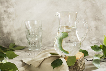 Birch sap in a glass jar