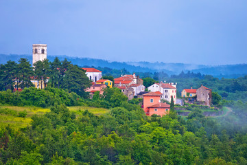Fototapeta na wymiar Village of Oprtalj in green hills
