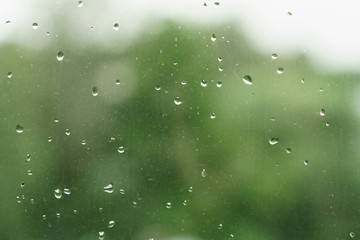real rain drops on window glass in high resolution