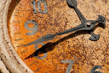 Retro background with old and rustic wall watches. Time concept.