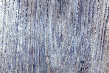 Abstract wooden board texture with scratches.