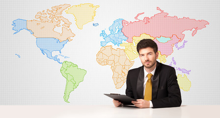 Business man with colorful world map background