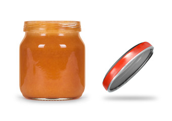 Open jar of jelly or baby food on a white background