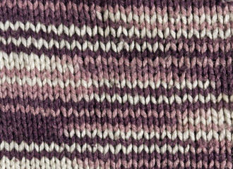 Abstract purple and pink color knitting texture.