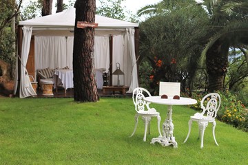 near Propriano, Corsica, France. 24.07.2016. A massage booth in a relaxing garden