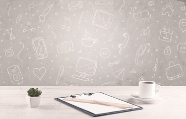 Design office desk with drawings background