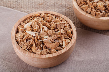 granola in wood bowl
