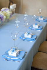 Nicely decorated wedding table with flowers and candles 