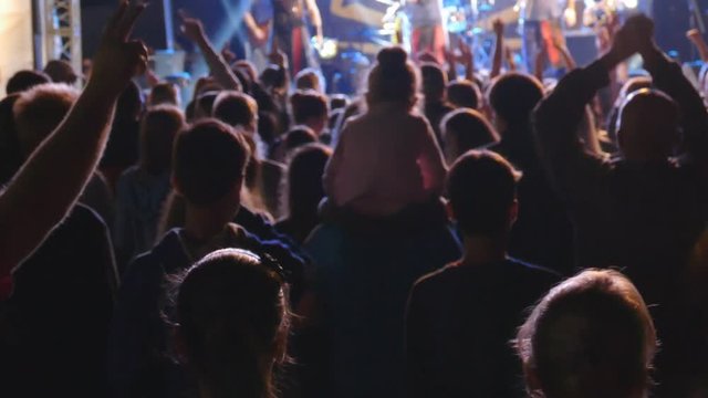 Unrecognizable people at the concert. Timelapse