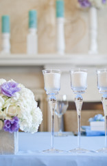 Nicely decorated wedding table with flowers and candles 