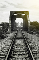 Fototapeta na wymiar railway and old steel bridge of railway,filtered image, light effect added, selective focus, mean 