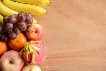 Naklejka na ściany i meble Fruit on the wooden floor