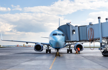 Commercial airplane parked at the airport