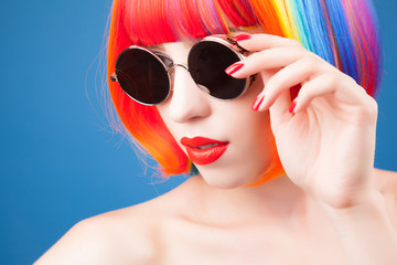 beautiful woman wearing colorful wig