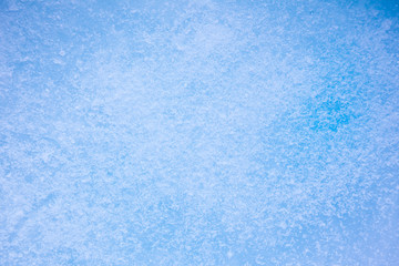Fototapeta na wymiar Textured ice blue frozen rink winter background
