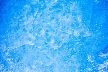 Textured ice blue frozen rink winter background