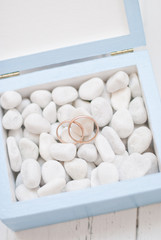 Wedding rings in blue box with white stone.Wedding ceremony 