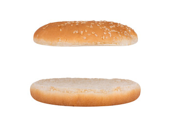 Bun with sesame cut isolated on white background