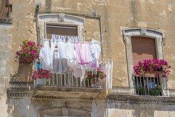 Typical Italian balcony with laundry