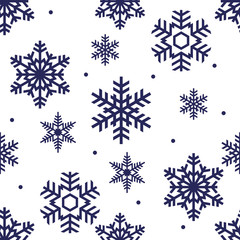 seamless winter pattern of blue openwork snowflakes on a white blue