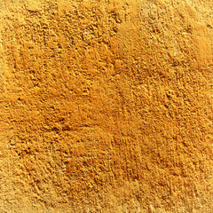 Texture orange plastered wall for background