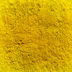 Texture yellow plastered wall for background
