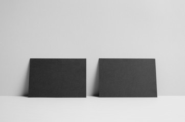 Black A6 Flyer / Postcard / Invitation Mock-Up - Wall Background