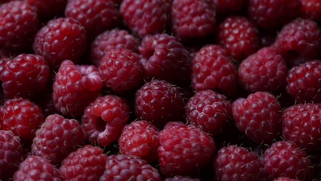 Rotating ripe raspberry. Turning closeup berries. 1920x1080. Full Hd

