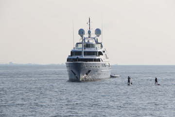 yacht in Maldives ocean, serfing