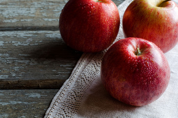 Red apples with drops of dew.