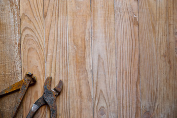 old tools on wooden background 