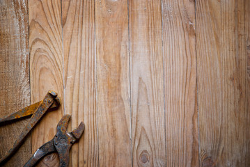 old tools on wooden background 