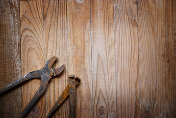 old tools on wooden background 