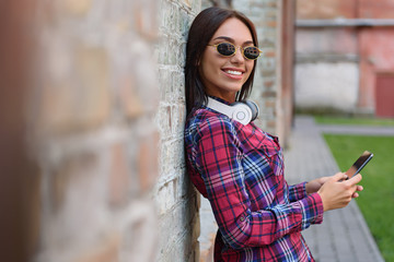 Pretty young woman using smartphone