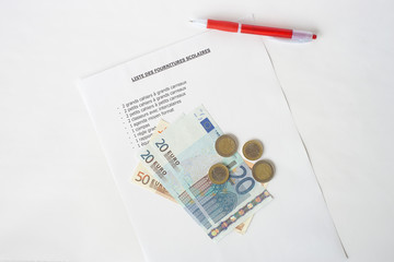 liste de fournitures scolaires et argent