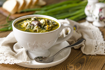 Soup with mushrooms paste offal carrots and herbs  