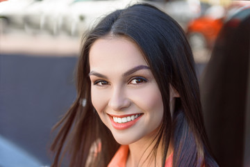 Fototapeta premium Cheerful girl expressing positive emotions