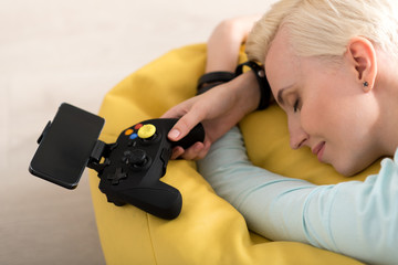 Woman sleeping after playing games © Viacheslav Yakobchuk