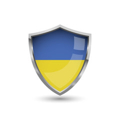Fototapeta premium National flag of Ukraine. Flag on the metal shield with glare.