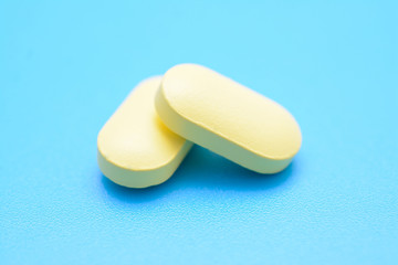 pills on a blue background