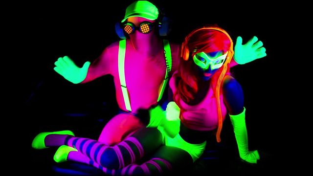 dancer babe fluorescent clothing under UV glow