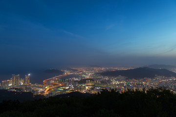 Naklejka premium View of Busan in South Korea from above at night. Copy space.