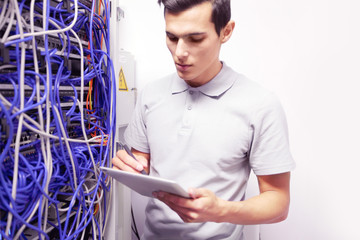 Man in network server room