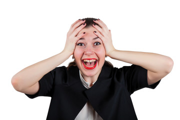 Young woman holding head and screaming happily