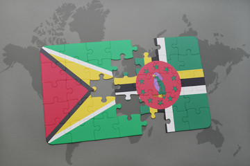 puzzle with the national flag of guyana and dominica on a world map background.