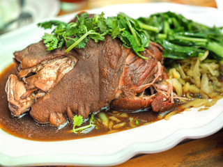 stewed pork leg with vegetable Yunnan style selective focus with blurred background